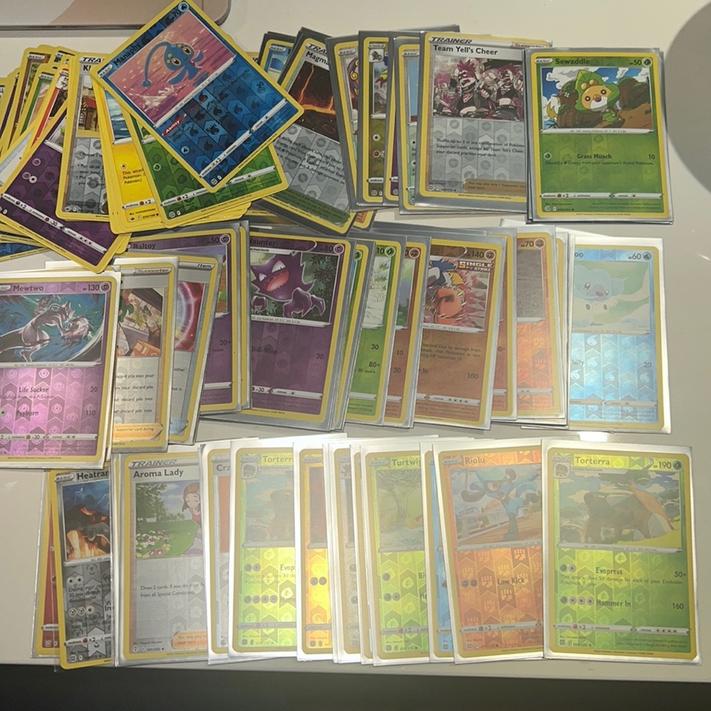 Over 100 holographic rare Pokémon cards